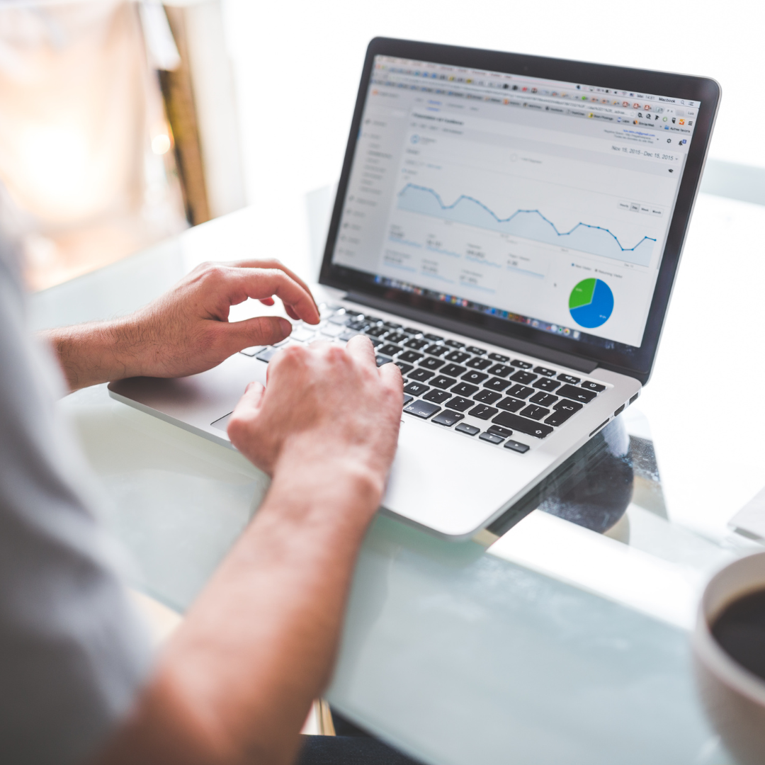 Paid advertising services and campaign performance analytics on laptop